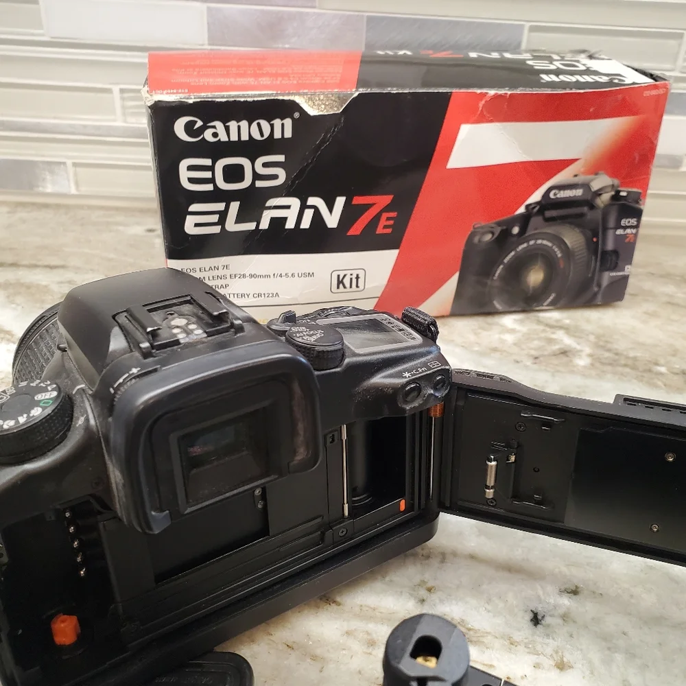Canon EOS Elan 7 and EOS Rebel G With Lens And Accessories (see notes)